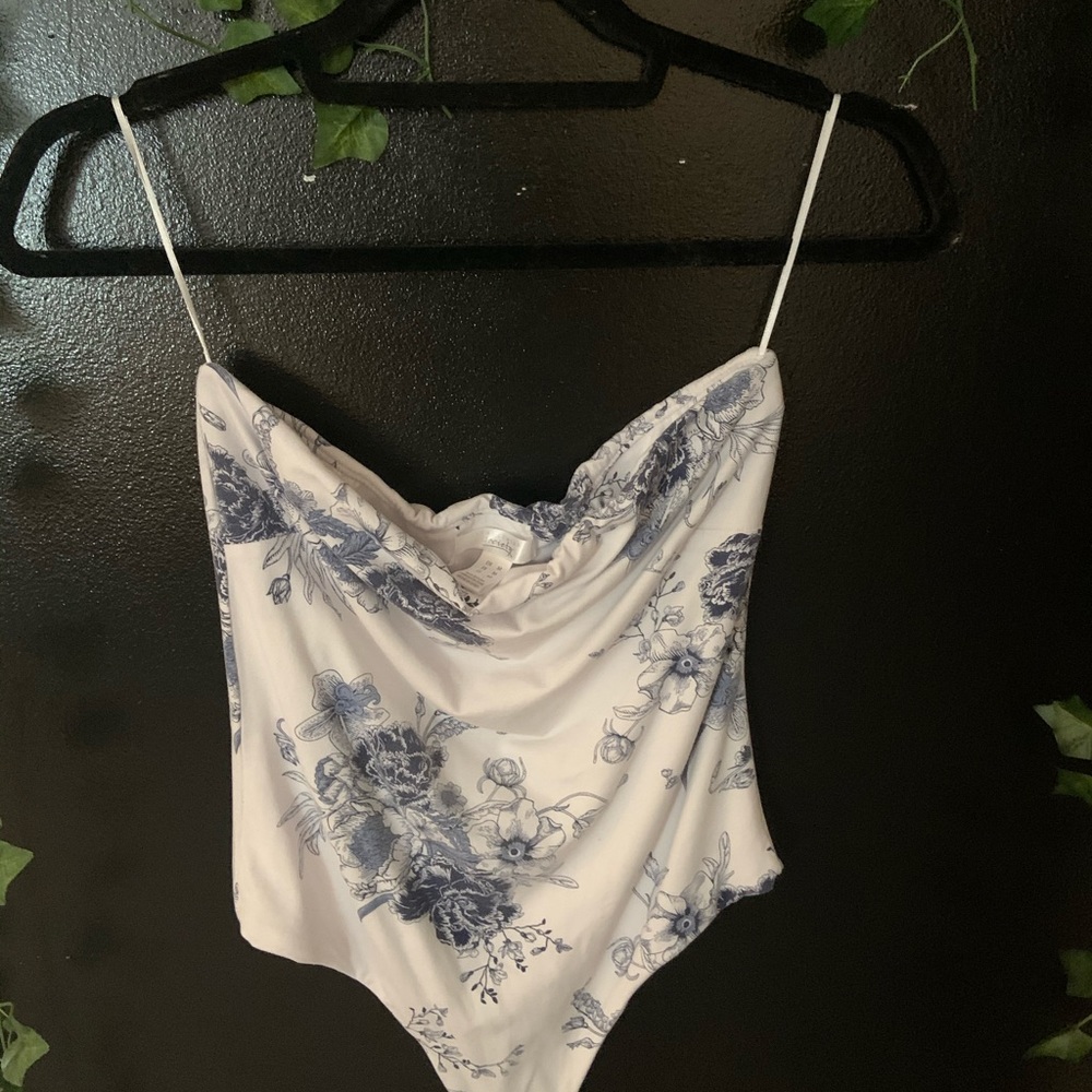 Super cute patterned blue and white bodysuit!